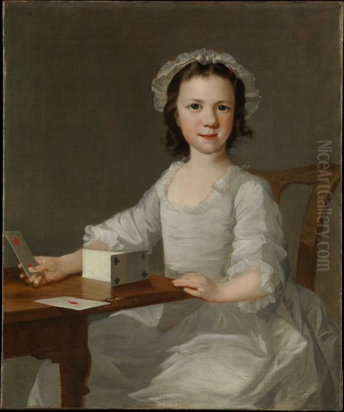 Girl Building a House of Cards - view 1