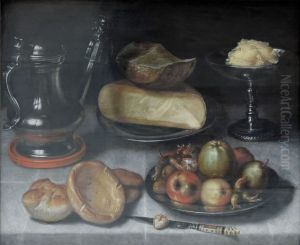 Still life of cheese, bread and fruit on a laid table