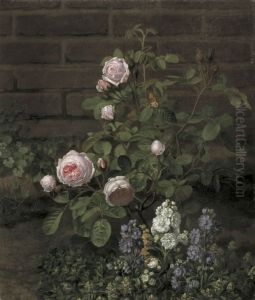 Et mosrosetrae omgivet af sommerblomster