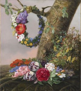 A bouquet of flowers at the foot of a tree. At a branch hangs a garland A bouquet of flowers at the foot of a tree. At a branch hangs a garland