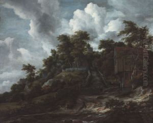 Wooded hillside with a view of Bentheim Castle by Jacob Van Ruisdael