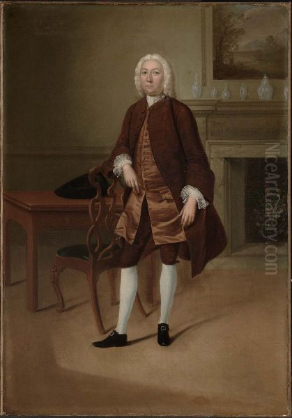 Portrait of a Man Standing Beside a Table - view 1