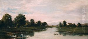 Woman Washing Clothes at the Edge of a River Woman Washing Clothes at the Edge of a River