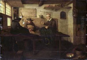 Tailor with two assistents in his workshop