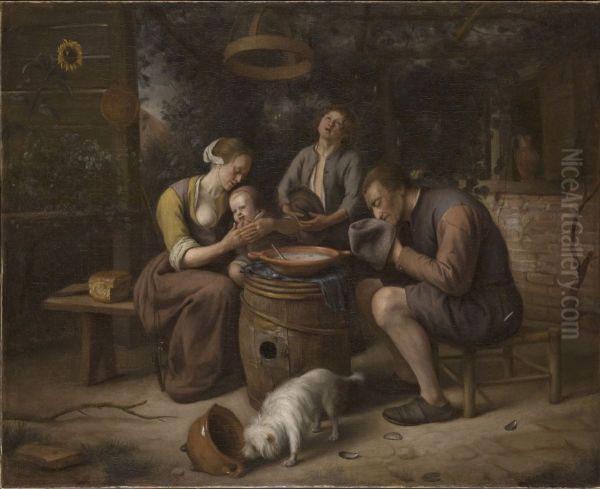 Family in prayer before a meal - view 1