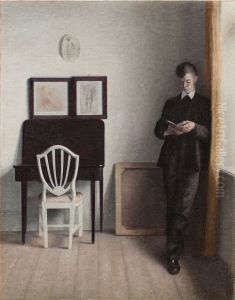 Interior with Young Man Reading by Vilhelm Hammershoi
