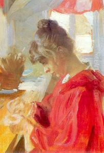 Marie sits at a table sewing