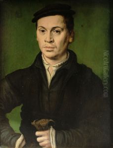 Man in black beret holding a pair of gloves