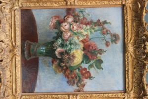 Flowers in a vase by Pierre Auguste Renoir
