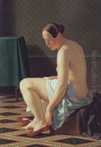 Femme nue mettant ses chaussons Femme nue mettant ses chaussons
