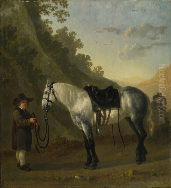 A Boy holding a Grey Horse - view 1