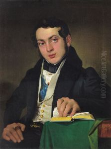 Sitting young man in a black frock coat