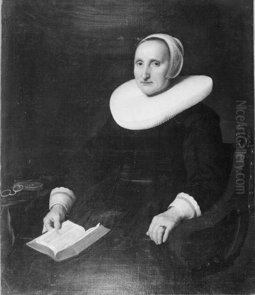 Woman sitting in Chair with Book - view 1