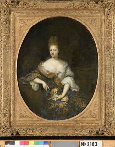 sitting lady with dog by Caspar Netscher