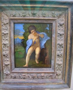 Junger Faun blast auf der Syrinx