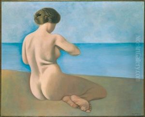 Baigneuse assise de dos sur le sable