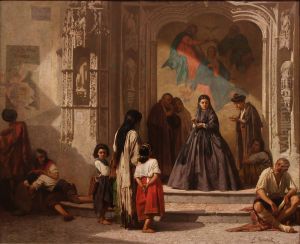 Young woman doing charity at the entrance to the chapel of San Sebastian Hospital in Cordoba