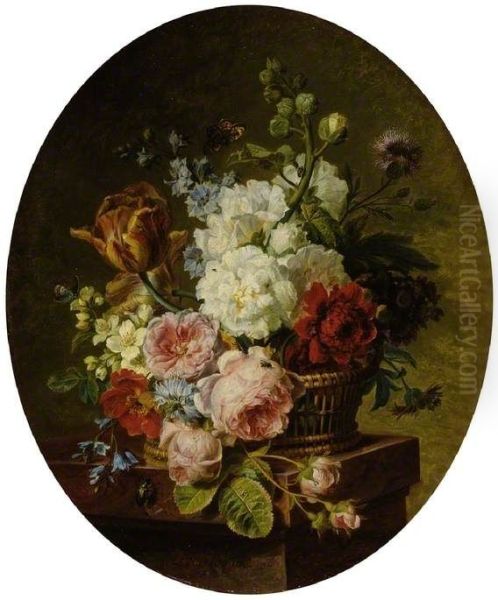 Open wicker basket of mixed flowers, including tulip, roses, harebell, hollyhock, poppy, larkspur and auricula on a marble ledge - view 1