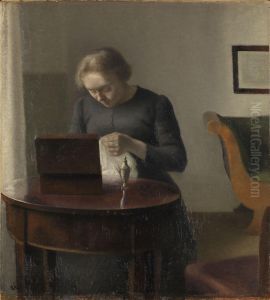 The Artist's Wife at a Sewing Table by Vilhelm Hammershoi