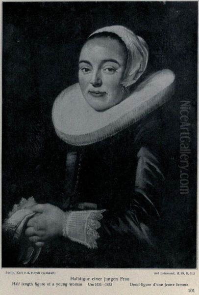 Portrait of a woman holding gloves - view 1