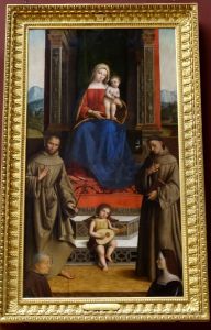 Madonna and Child enthroned with Saints Francis, Anthony and two donors by Niccolo Pisano