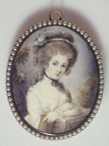 Portrait d'une jeune femme appuyee sur ses bras croises Portrait d'une jeune femme appuyee sur ses bras croises