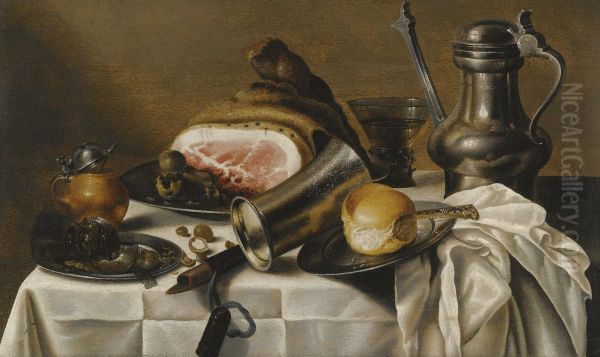 A Still Life Of Ham, A Pewter Plate, A Pewter Pitcher, A Glass Roemer, Hazelnuts, A Bread Roll And Other Objects On A White Table Cloth - view 1