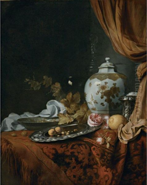 A Blue And White Facetted Vase, A Rose And Walnuts On A Pewter Plate, A Wanli 'kraak' Porcelain Bowl, A Silver Wine Cooler, A Wineglass, A Glass, A Lemon And Roses On A Table Draped With A Carpet - view 1