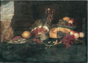 Still Life Of Fruit In A Blue-and-white Porcelain Bowl, Grapes, Peaches, A Pie, Peeled And Whole Lemons On Pewter Plates, Shrimp, A Ham, And An Ormolu Tazza Behind, All Set Upon A Table by David Cornelisz. de Heem