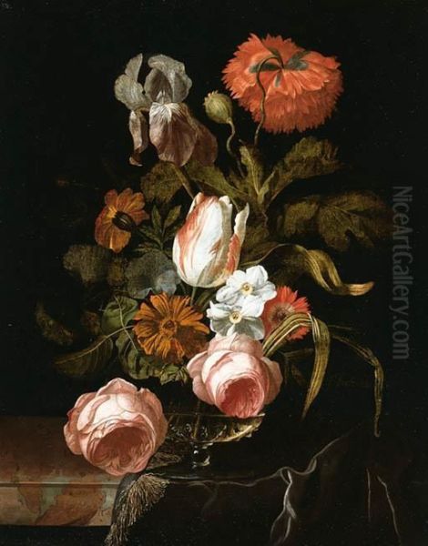A Tulip, Roses, An Iris, A Peony And Other Flowers In A Glass Vaseon A Partially Draped Stone Ledge - view 1