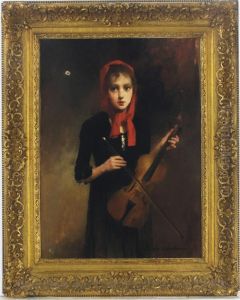 A Young Girl Holding A Violin