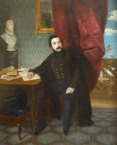 Retrato De Caballero De Cuerpo Entero Sentado Junto A Una Mesa Con Libros... Retrato De Caballero De Cuerpo Entero Sentado Junto A Una Mesa Con Libros...