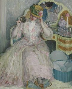 Lady Trying On A Hat Signed And Dated 'f.c. Frieseke- 1909' Oil On Canvas 64¼ X 52 In by Frederick Carl Frieseke