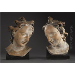 A Pair Of South German Limewood Heads Of Angels, Attributed To The Workshop Of Ignaz Gunther (1725-1775), Mid 18th Century