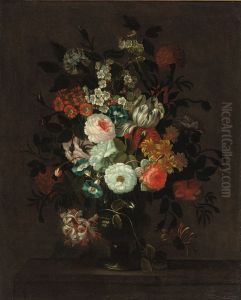Roses, Tulips, Morning Glory And Other Flowers In A Glass Vase On A Ledge