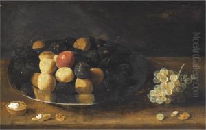 A Still Life With Plums On A Silver Tazza, Together With Grapes Anda Walnut, All On A Wooden Table
