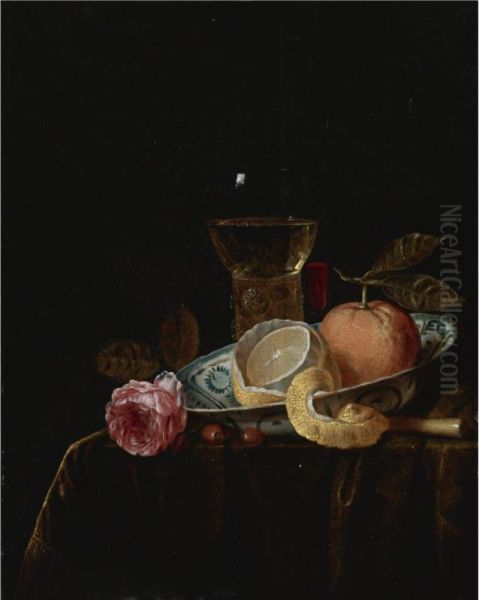 Still Life With A Peeled Lemon And An Orange In A Blue And White Porcelain Bowl, A Roemer, A Tall Wine Glass, A Rose And Other Objects On A Draped Table - view 1