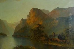 A Loch And Highland Landscape With A Cottage At Sunset