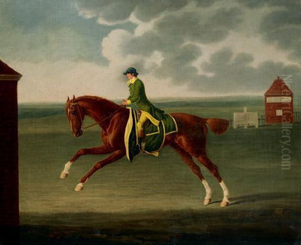 A Chestnut Racehorse With Jockey Up On Newmarket Heath - view 1