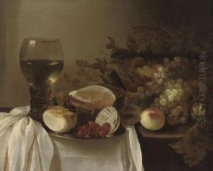 A Roemer Of Wine, A Pewter Platter With A Bread Roll, A Bowl Of Raspberries, A Joint Of Ham, Peaches And Grapes On A Partly-draped Table by Cornelis Cruys