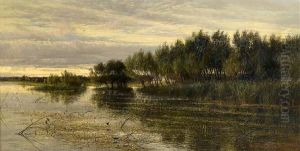 A River Landscape At Sunset