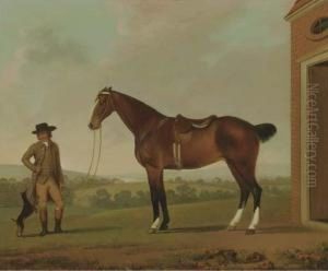 A Groom Holding A Saddled Hunter Outside A Stable With Aterrier