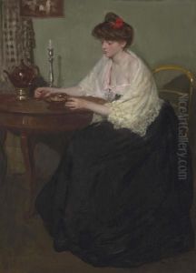 Woman Sitting At A Table