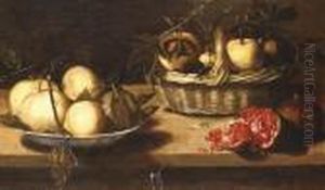 Quinces In A Basket And In A Ceramic Dish With A Pomegranate On A Tabletop