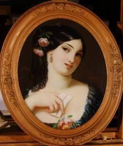 Head And Shoulders Portrait Of A Young Woman Holding A Love Letter