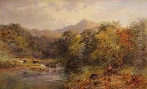 An Extensive Landscape With Cattle Watering