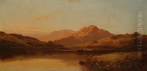 Cattle Watering In A Highland Landscape At Sunset Cattle Watering In A Highland Landscape At Sunset