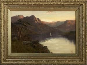 "mountainous Landscape At Sunset With SailboatsOn A Lake"