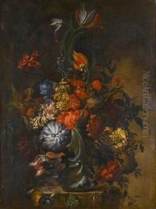 Tulips, Chrysanthemums, An Iris And Otherflowers In A Glass Vase On A Stone Ledge by Paolo Porpora