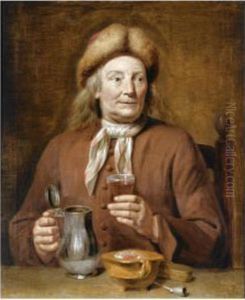 A Man Sitting At A Table Holding A Glass Of Beer